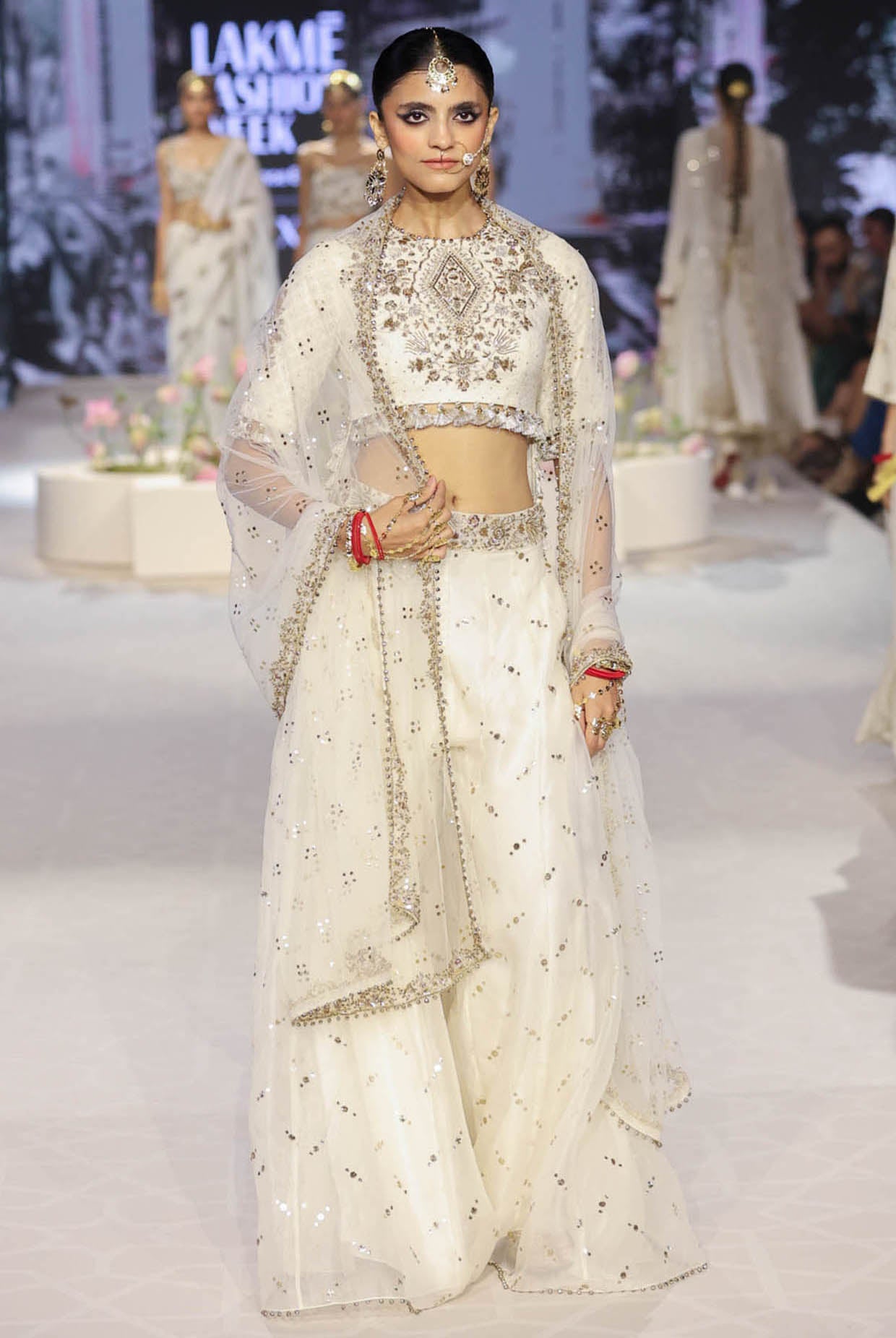 Shakira Off White Embroidered High Low Choli With Sharara And Dupatta