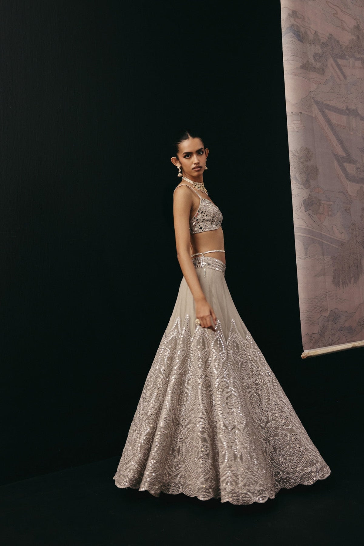 Silver Zari Mirrorwork Lehenga with Cape Sleeves Jacket and Bralette