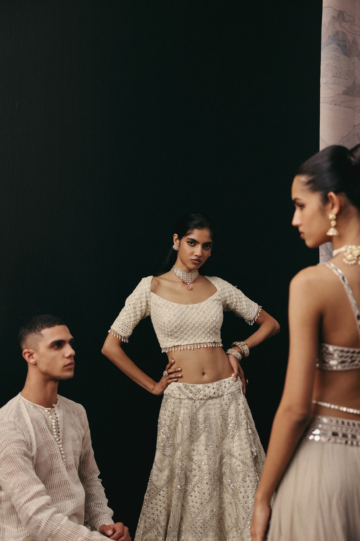 Silver Zari Mirrorwork Lehenga with Cape Sleeves Jacket and Bralette