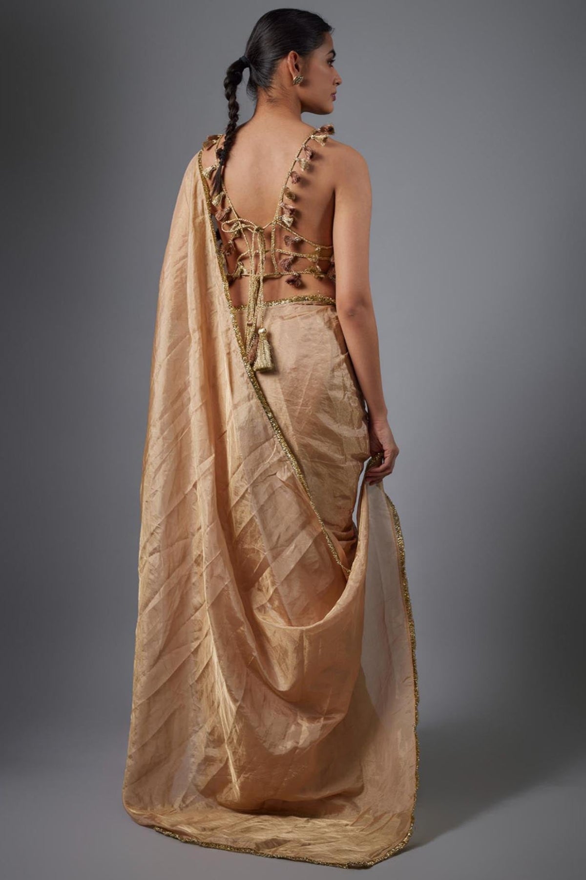 Dull Rose Color Embroidered Tissue Fabric Short Choli With Stitched Saree