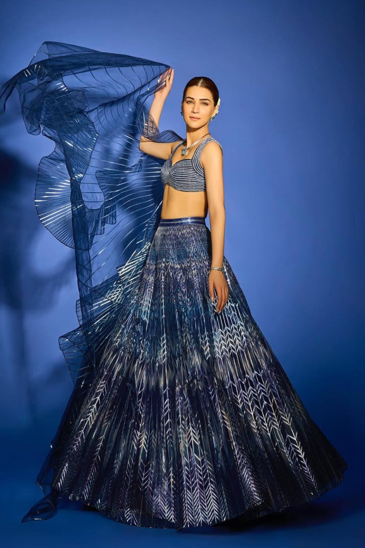 Kriti Sanon in Metallic Fluted Tulle Printed Skirt With Ruffle Drape And Structured Crystalvein Top