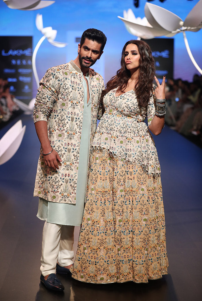 Neha Dupia and TAHIR in ICE BLUE SILK KURTA WITH OFF WHITE SILK PANT AND STONE ORGANZA JACKET