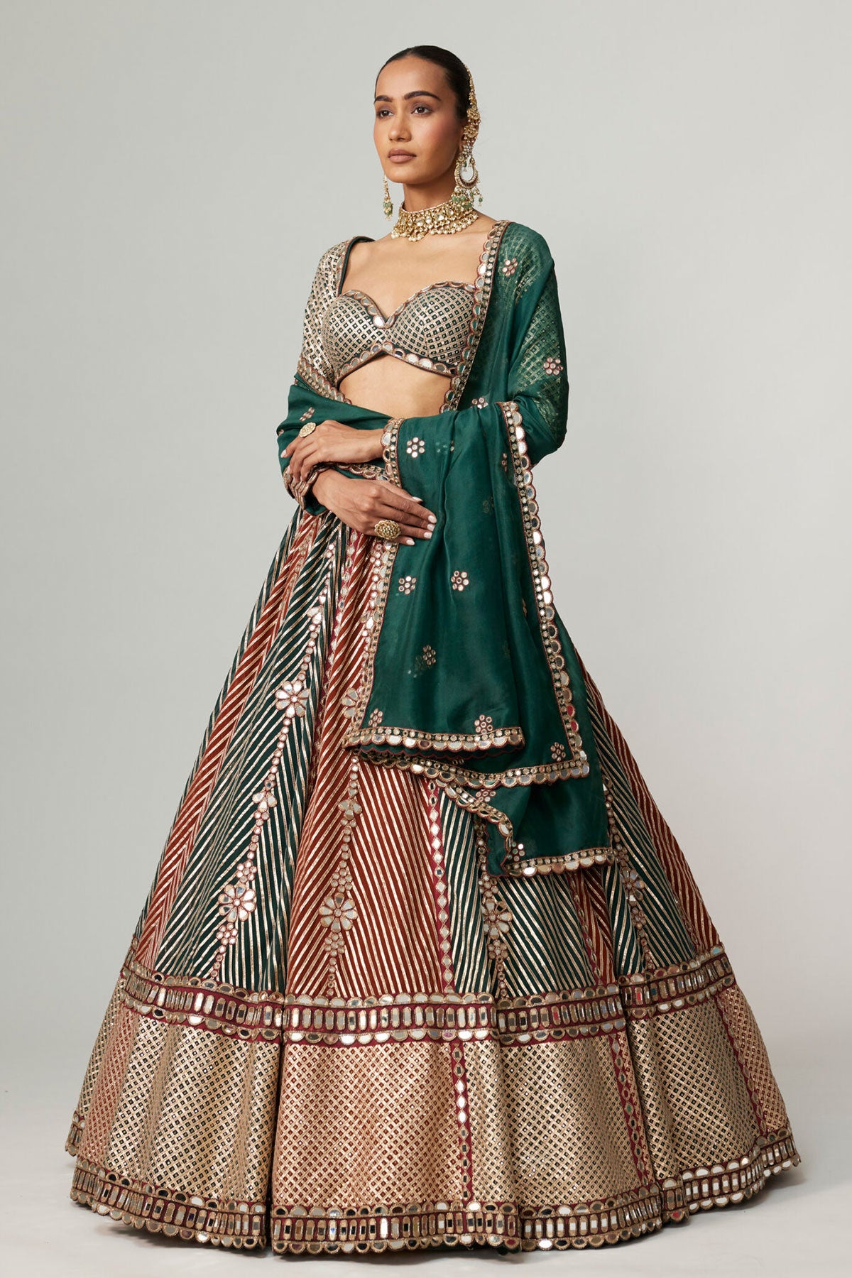 CRANBERRY FLOWER LINEAR LEEHNGA WITH FULL SLEEVE BLOUSE.