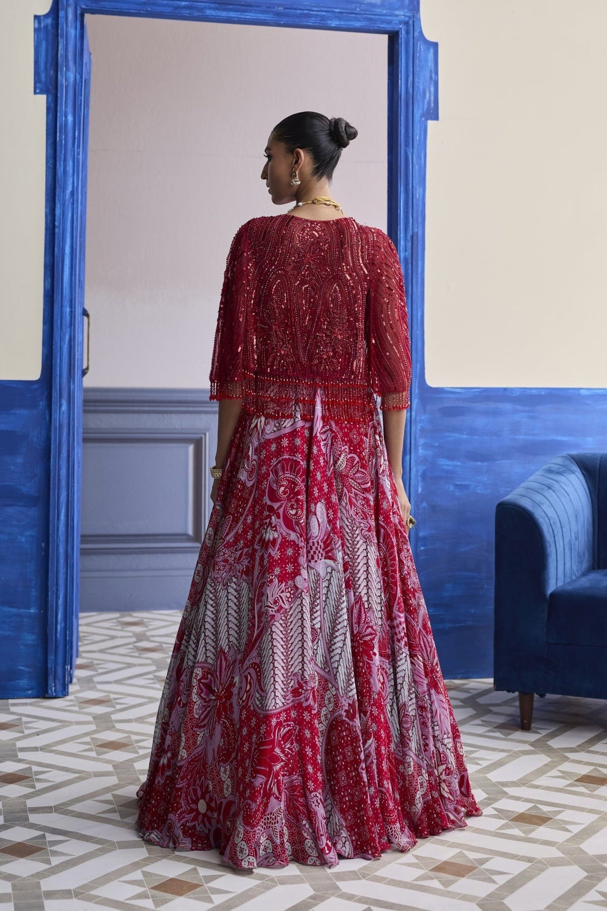 Red Embroidered Blouse With Tassel Cape Jacket & Floral Lehenga Set