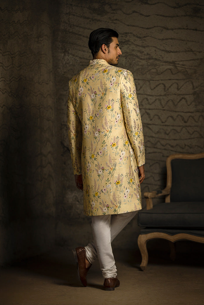 YELLOW PRINTED DUPION SILK SHERWANI WITH OFF WHITE COTTON SILK CHURIDAR