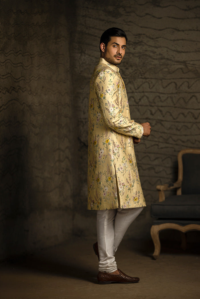 YELLOW PRINTED DUPION SILK SHERWANI WITH OFF WHITE COTTON SILK CHURIDAR