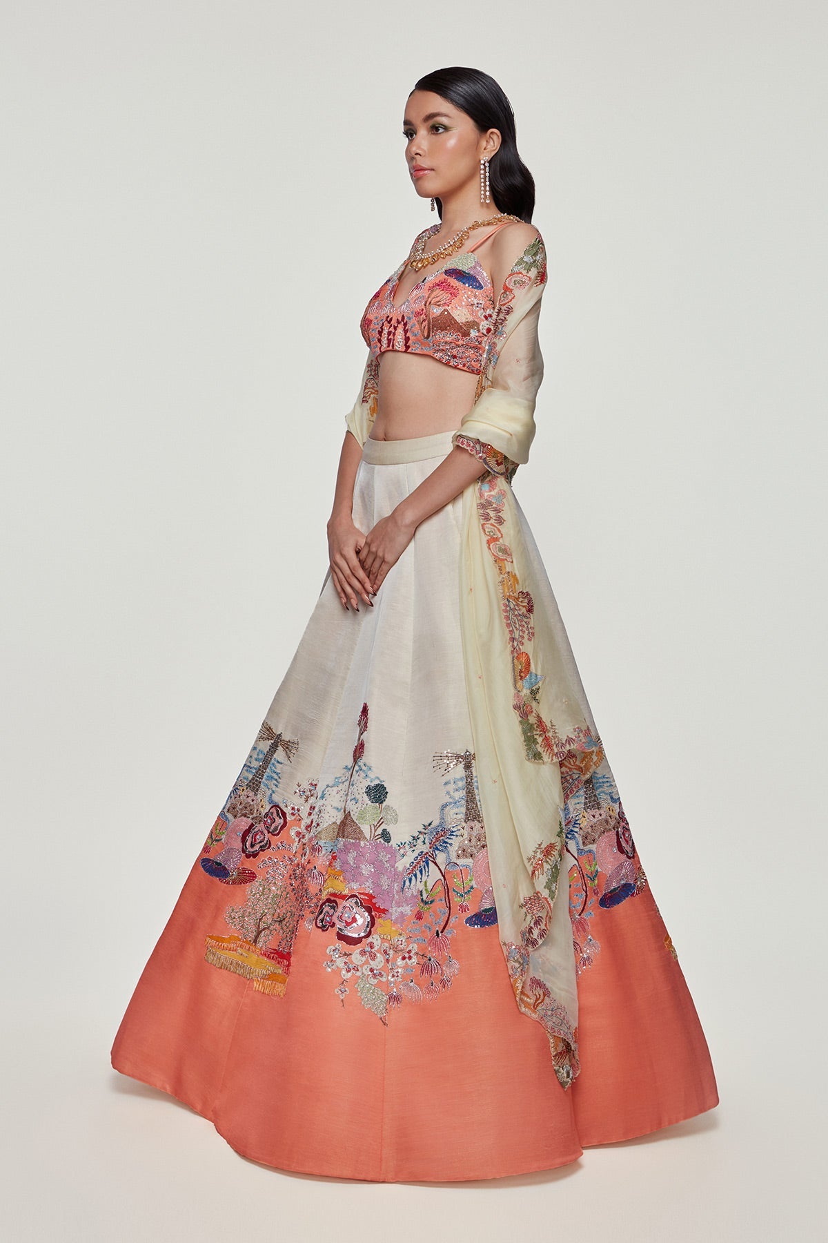 VALENTINA - Ivory And Peach Divergence Silk Appliquéd And Embellished Lehenga With Blouse And Cutwork Organza Dupatta