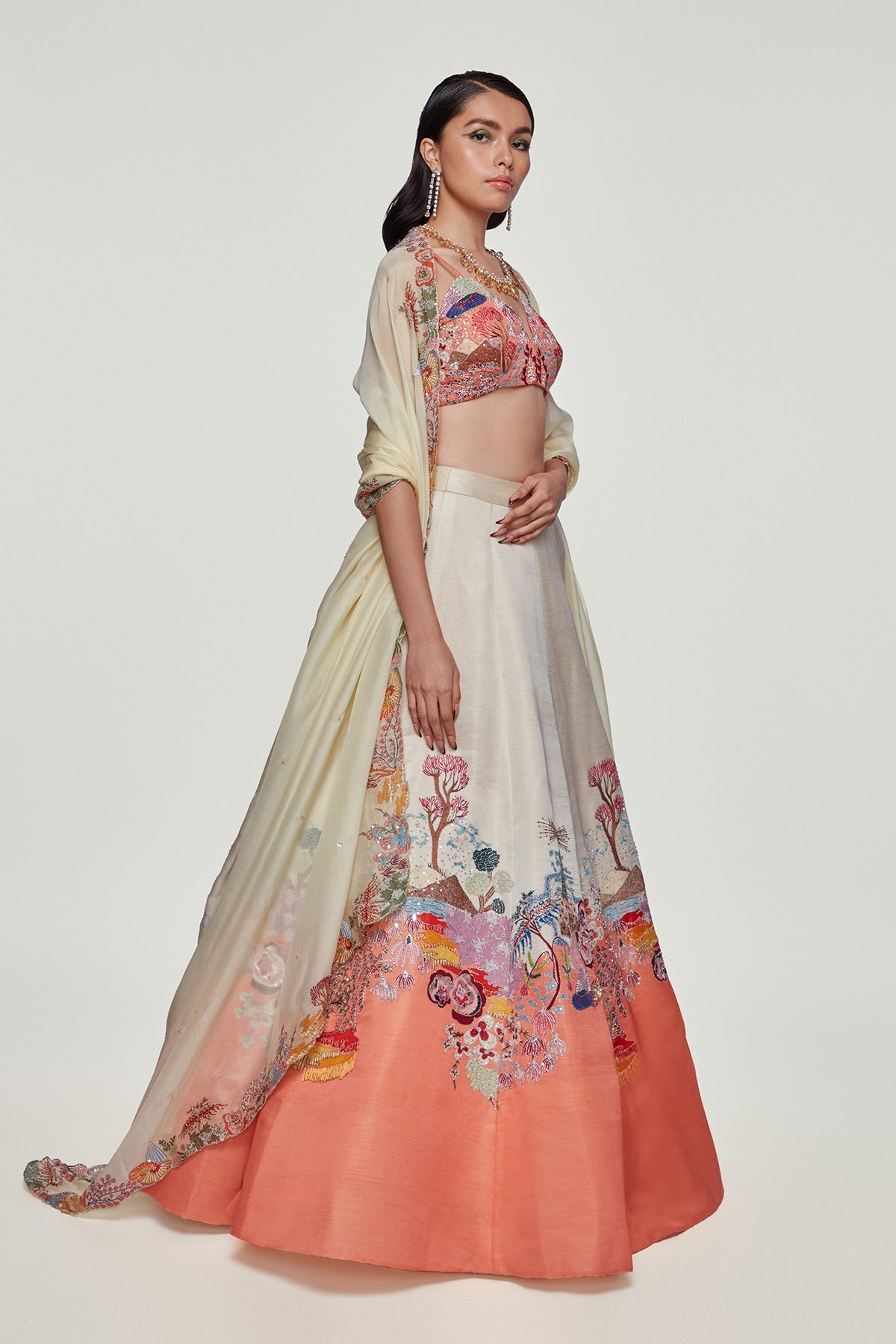VALENTINA - Ivory And Peach Divergence Silk Appliquéd And Embellished Lehenga With Blouse And Cutwork Organza Dupatta