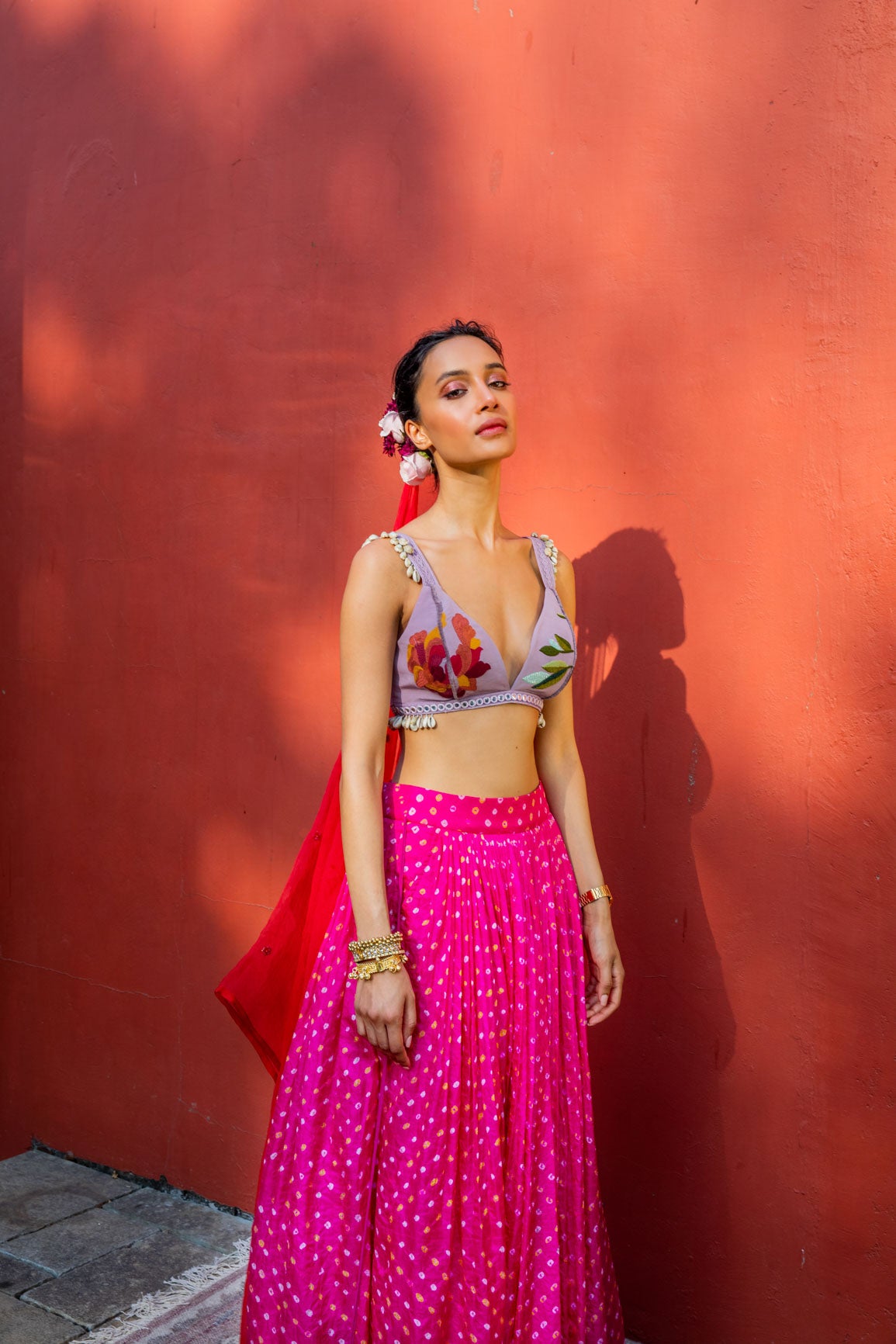 Pink bandhini, lilacs and red