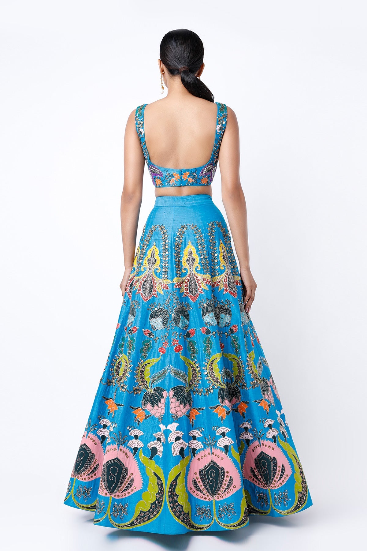 INARA - Cyan Blue Nadenka Raw Silk Appliquéd And Embellished Lehenga With Blouse And Cutwork Tulle Dupatta