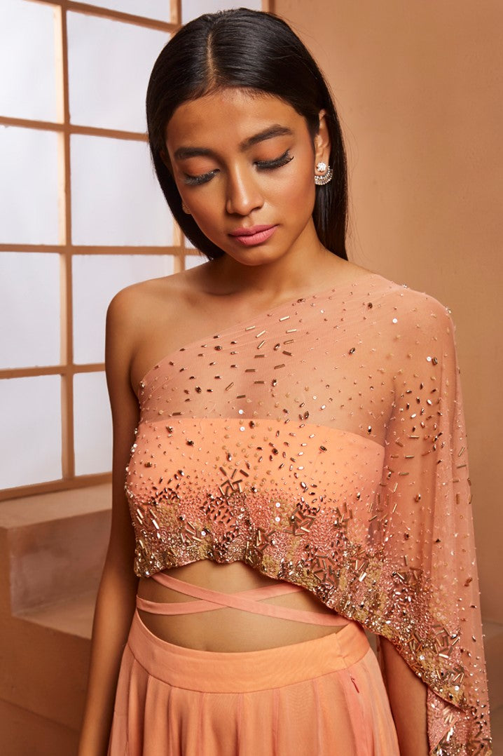 PEACH EMBELLISHED BLOUSE WITH DRAPE AND SLIT SKIRT