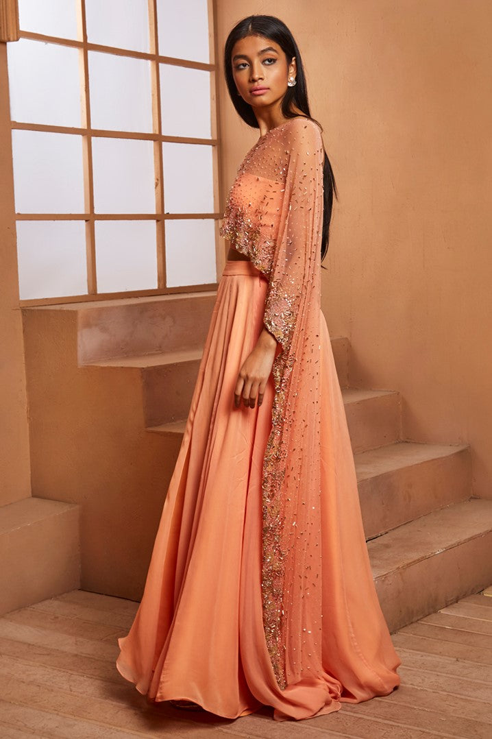 PEACH EMBELLISHED BLOUSE WITH DRAPE AND SLIT SKIRT