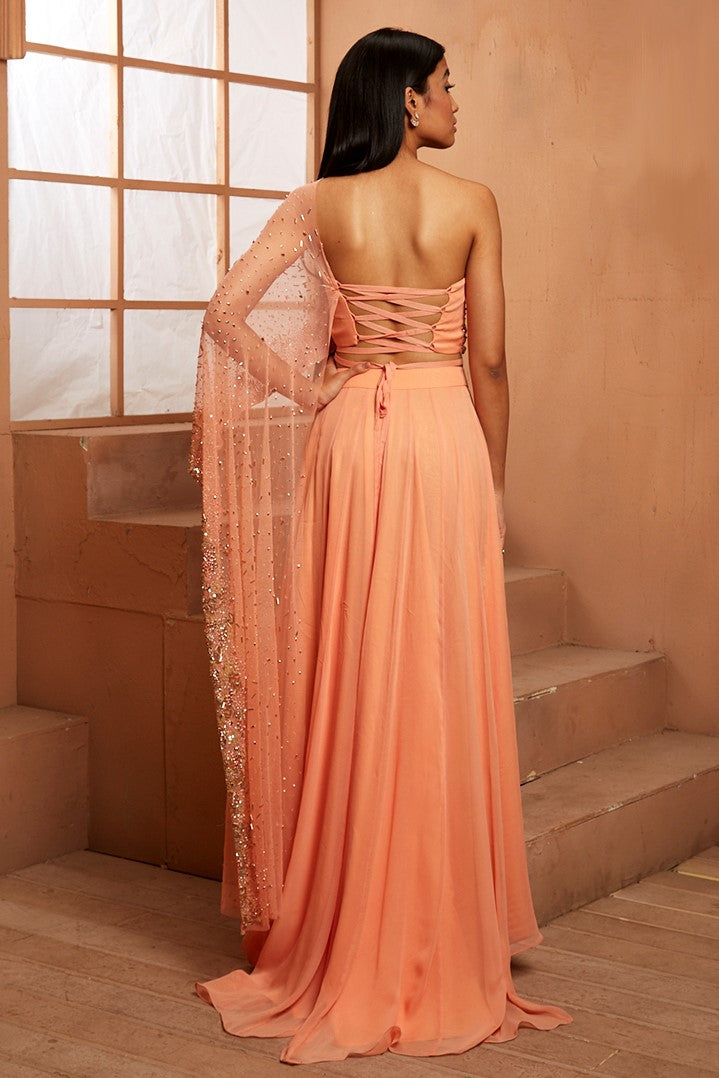 PEACH EMBELLISHED BLOUSE WITH DRAPE AND SLIT SKIRT
