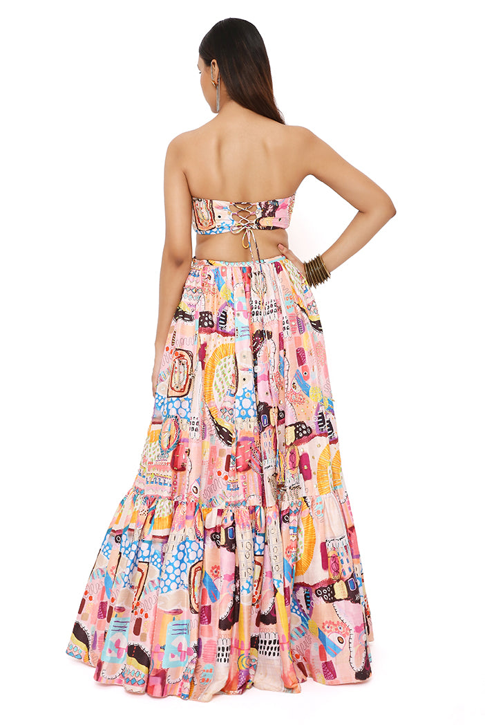 AMALIA TRANCE PRINT DUPION SILK EMBROIDERED BUSTIER WITH FRILL HEM LEHENGA AND MUKAISH NET DUPATTA