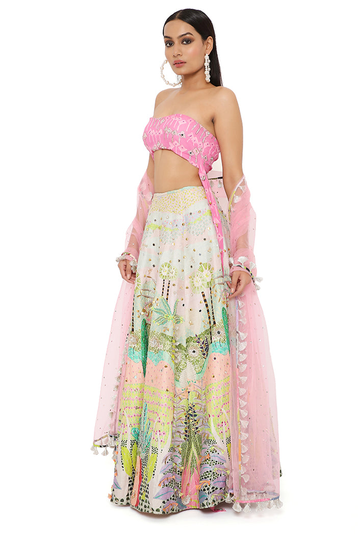 IVANA PINK KITE PRINT EMBROIDERED BUSTIER WITH TROPICAL PRINT EMBROIDERED LEHENGA AND MUKAISH NET DUPATTA