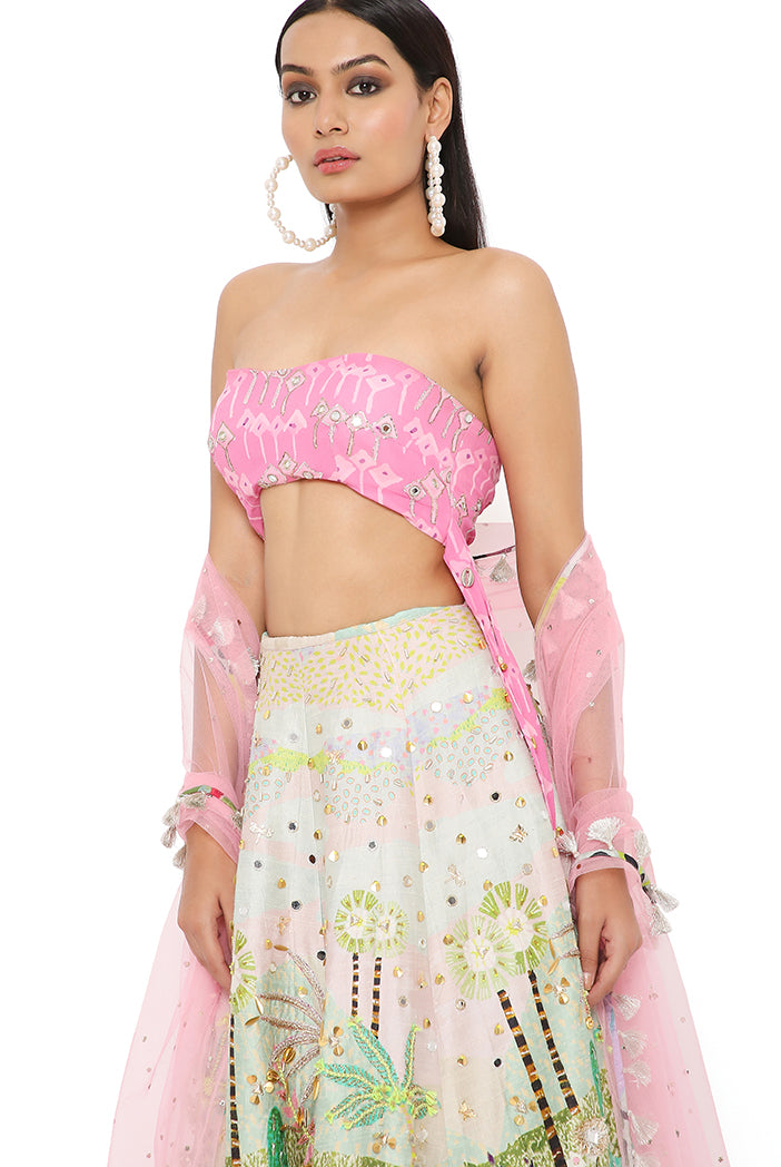 IVANA PINK KITE PRINT EMBROIDERED BUSTIER WITH TROPICAL PRINT EMBROIDERED LEHENGA AND MUKAISH NET DUPATTA