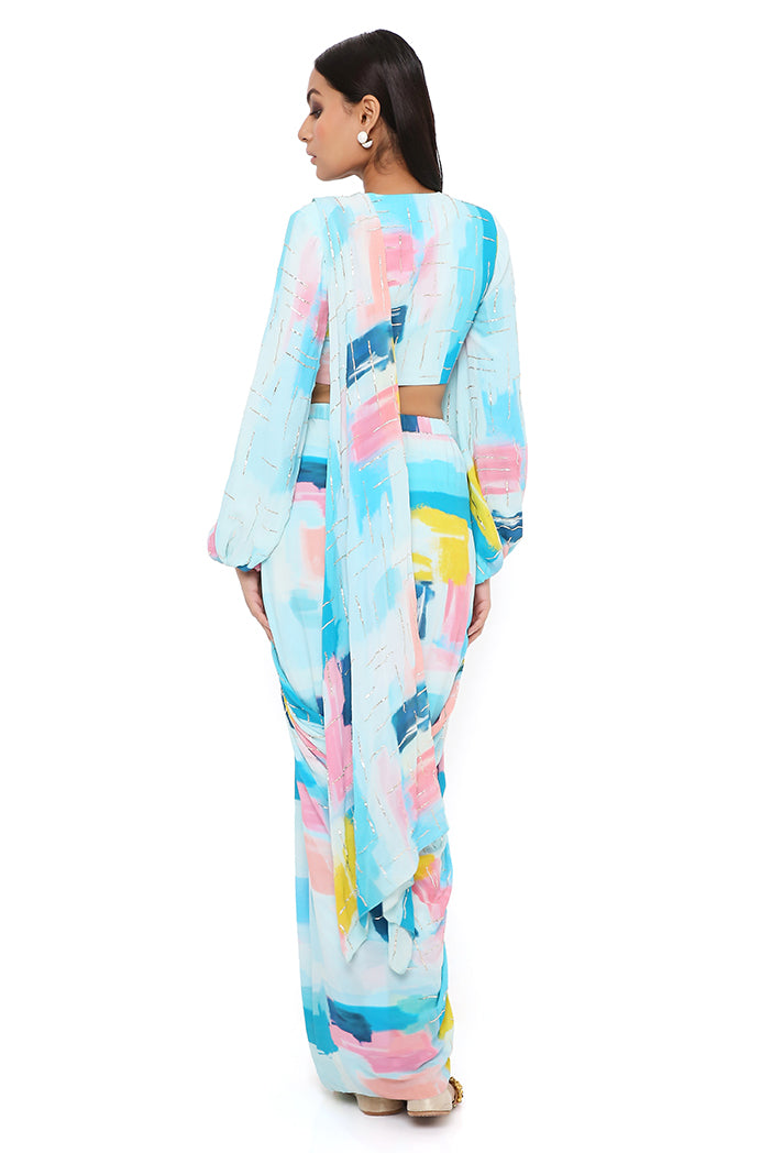 NAISHA BLUE PAINTERLY PRINT GEORGETTE EMBROIDERED FRONT TIE-UP CHOLI AND PRE-STITCHED SAREE WITH EMBROIDERED PALLU