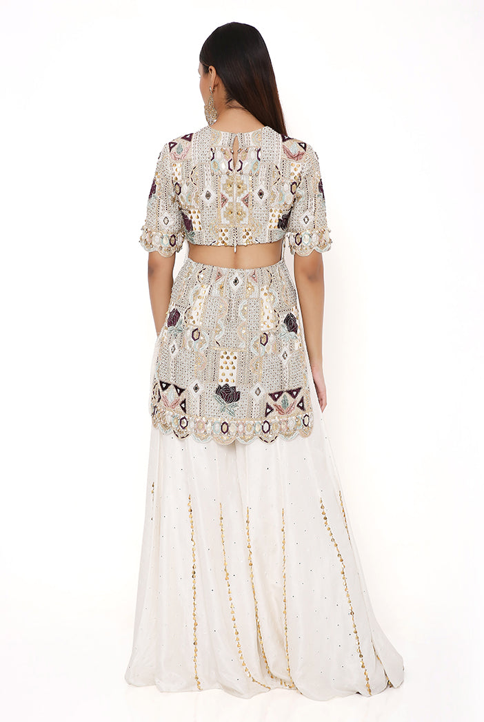 NAVYA OFF WHITE GEORGETTE EMBROIDERED KURTA AND ABLA SILK SHARARA WITH NET MUKAISH DUPATTA