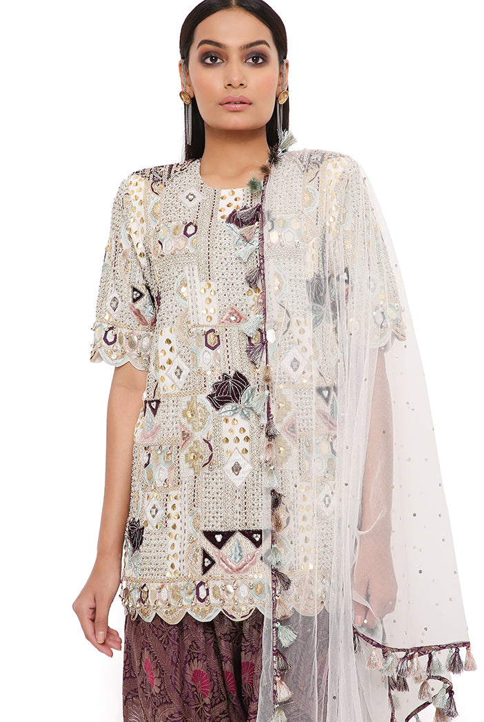 OFF WHITE GEORGETTE EMBROIDERED KURTA WITH PURPLE BROCADE SALWAR AND OFF WHITE MUKAISH NET DUPATTA