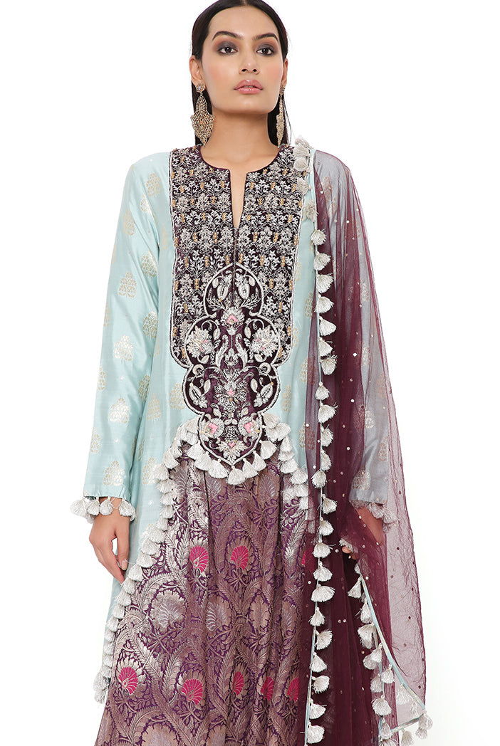 POWDER BLUE BROCADE SILK HIGH LOW KURTA WITH PURPLE BROCADE LOW CROTCH PANT AND PURPLE MUKAISH NET DUPATTA