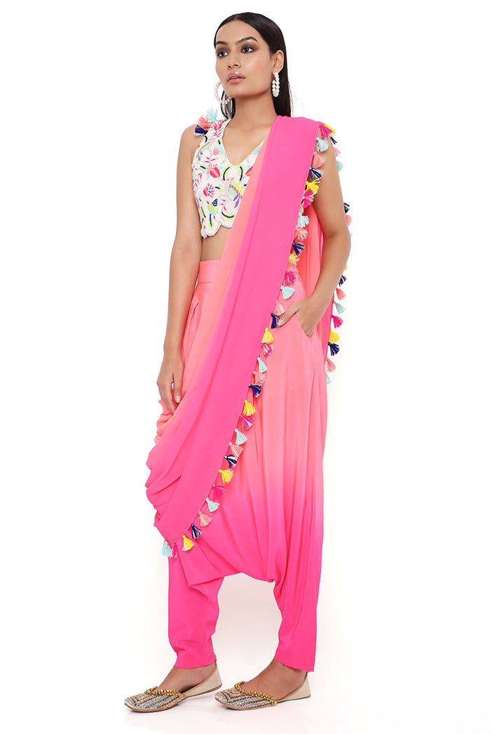 STONE GEORGETTE EMBROIDERED CHOLI WITH CORAL AND PINK CREPE SHADED LOW CROTCH AND GEORGETTE ATTACHED DRAPE