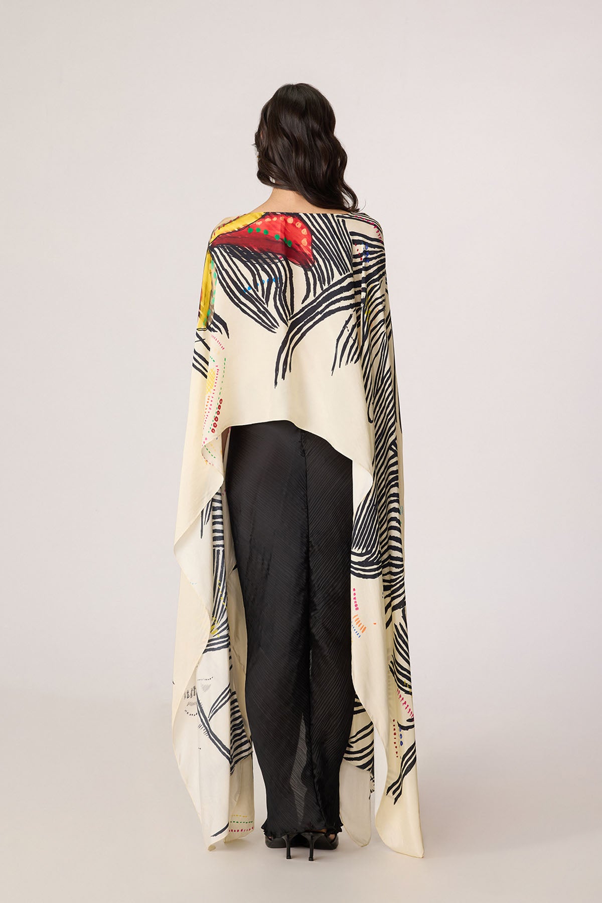 Genesis Cape and Gigi Skirt
