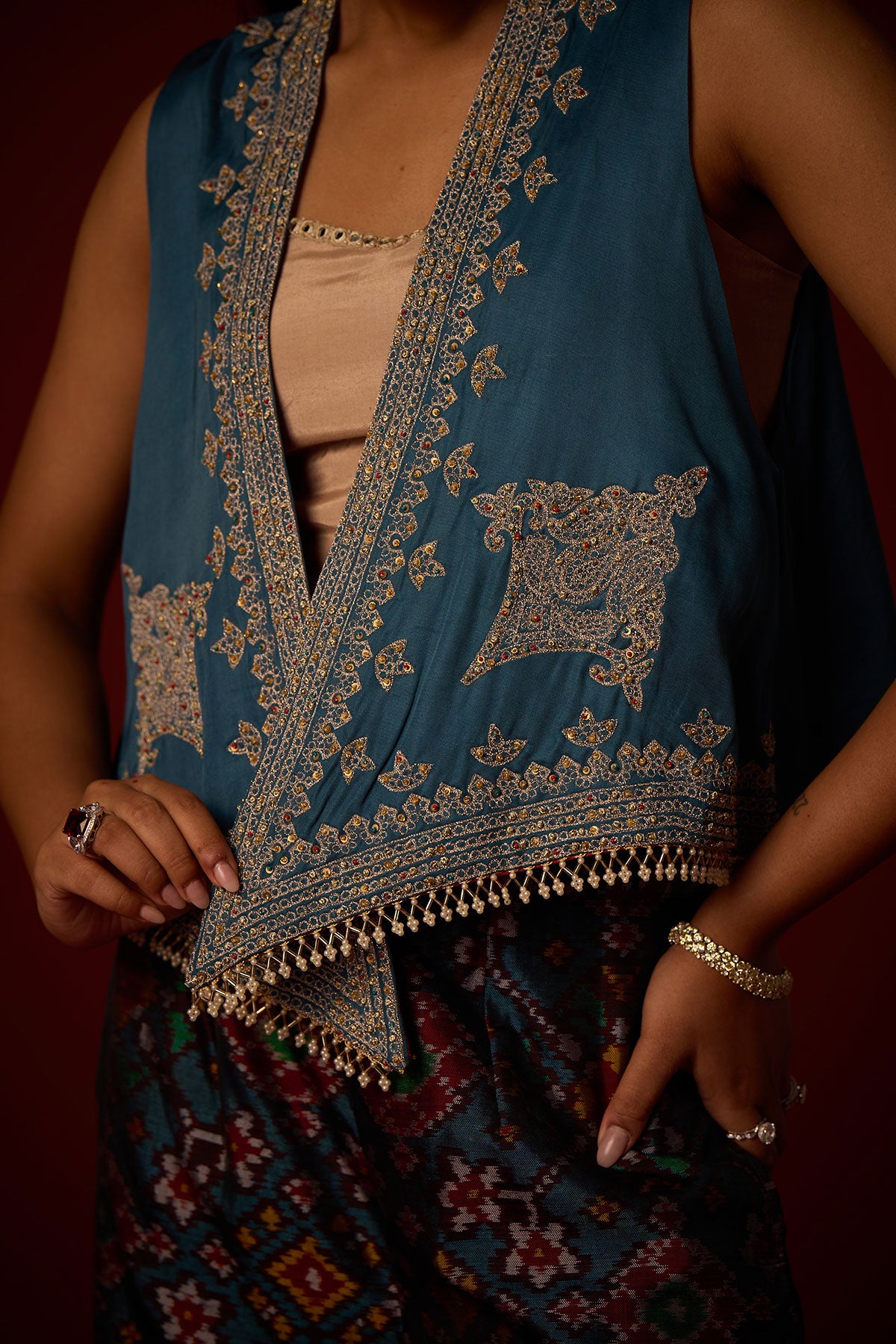 Asymmetrical Gilet and Bandeau and Patola Flared Palazzos.