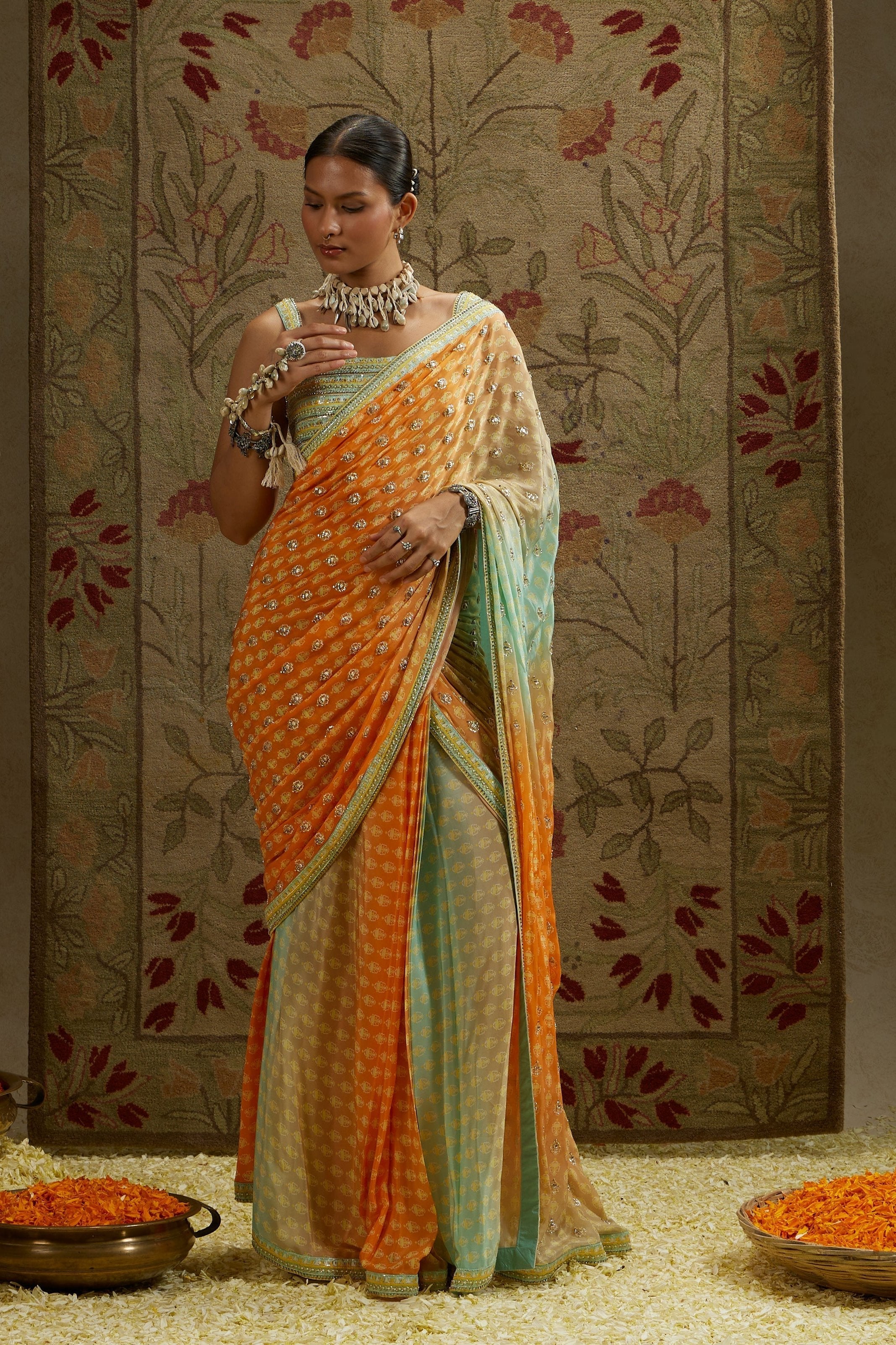 TEAL BLUE ORANGZA EMBELLISHED SAREE PAIRED WITH EMBELLISHED BLOUSE
