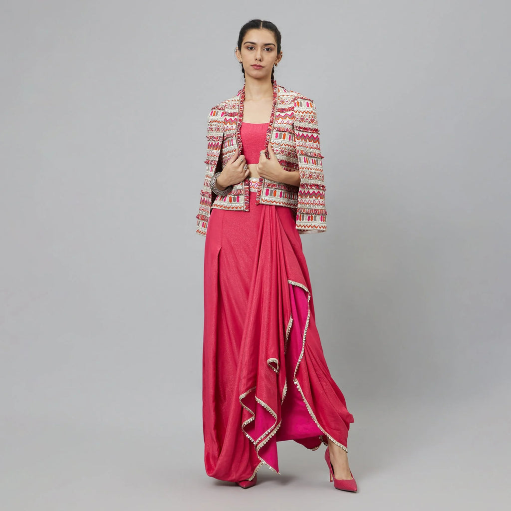 PINK NUSHRAT DRAPED SKIRT AND BUSTIER TEAMED WITH A SIGNATURE STRUCTURED JACKET