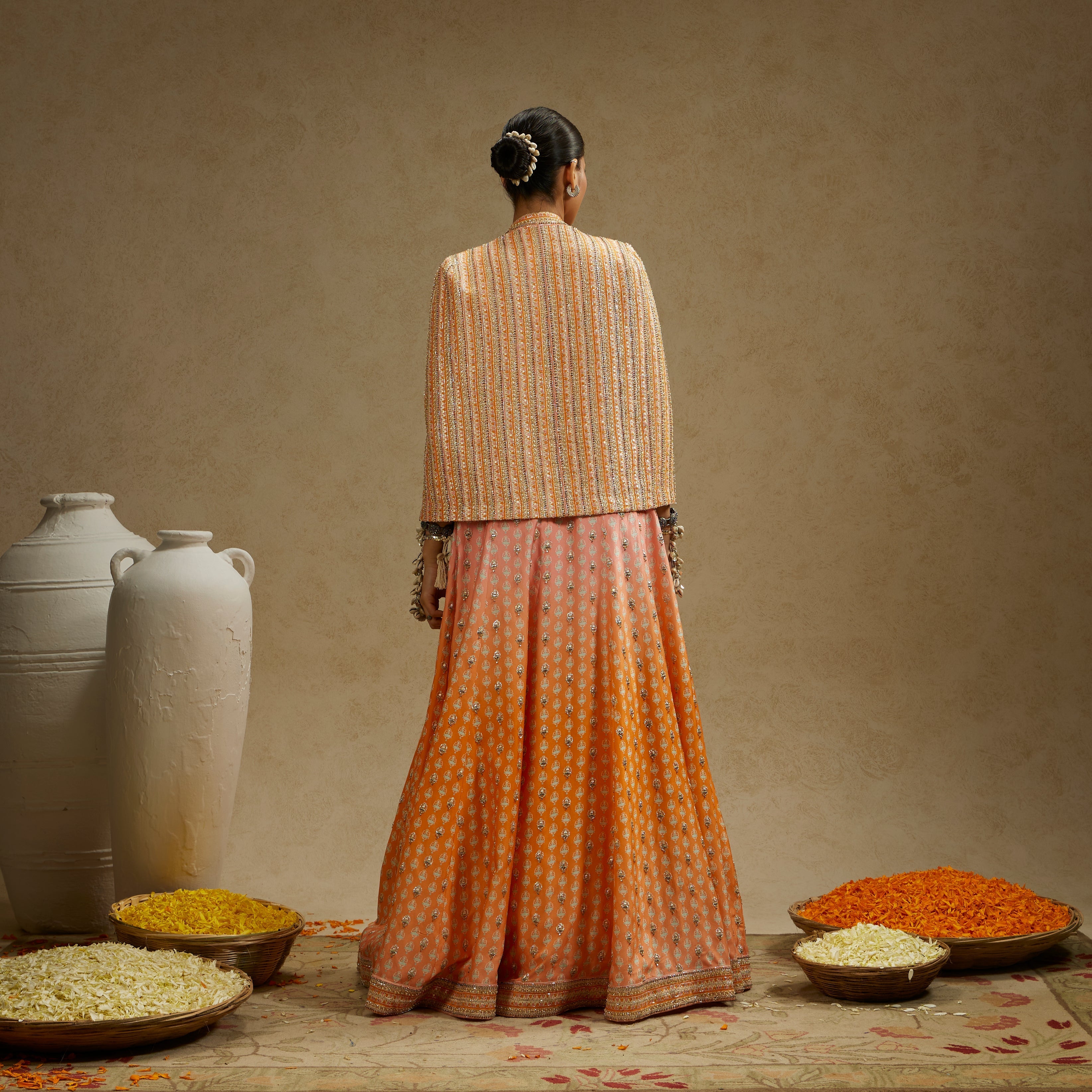 Border Embellished Noor Jacket Paired With Embellished Bustier And Ombre Embellished Lehenga