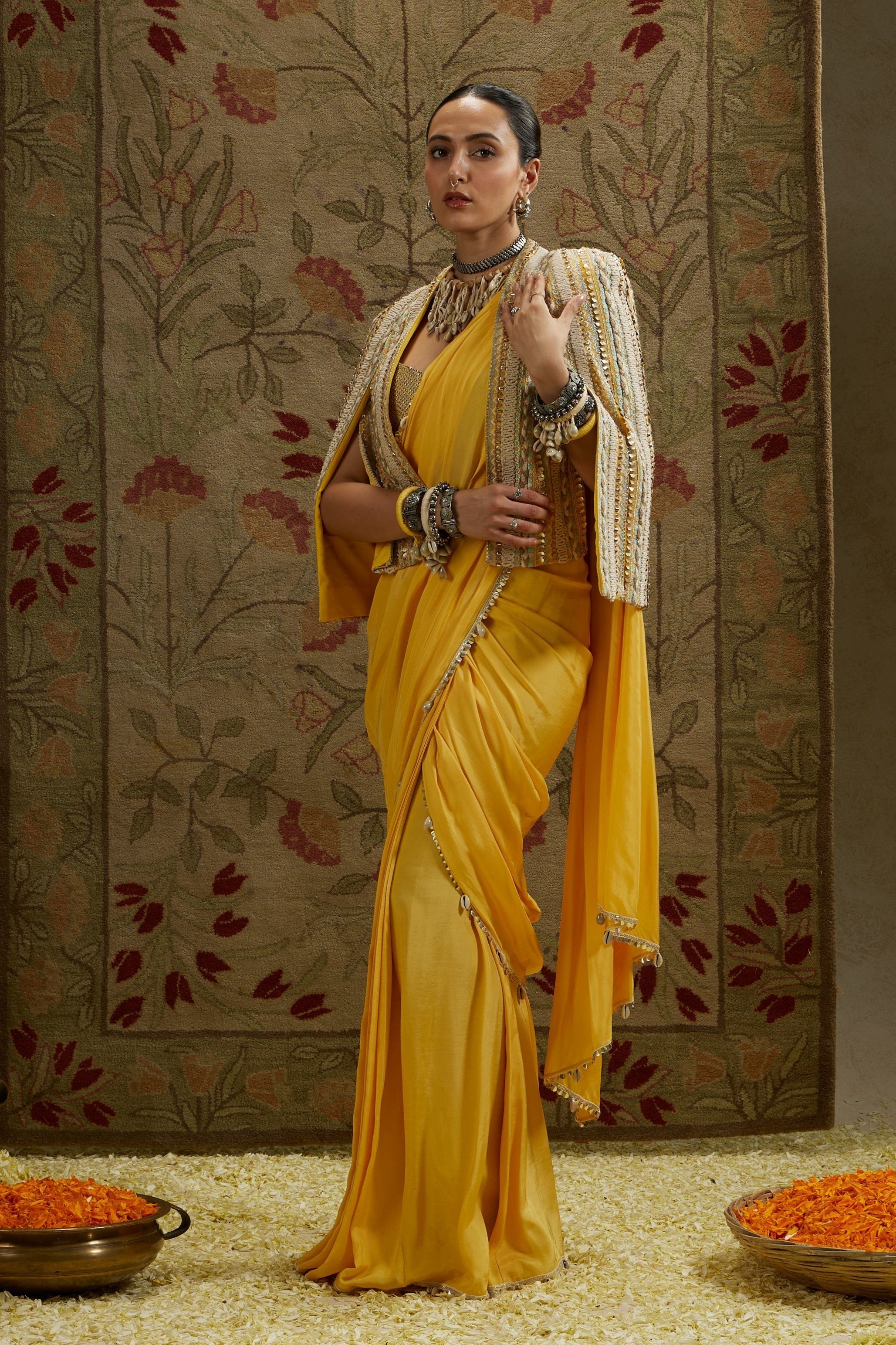 Dandelion Pre-Draped Saree Paired With Metal Embellished Bustier And Embellished Cape Jacket