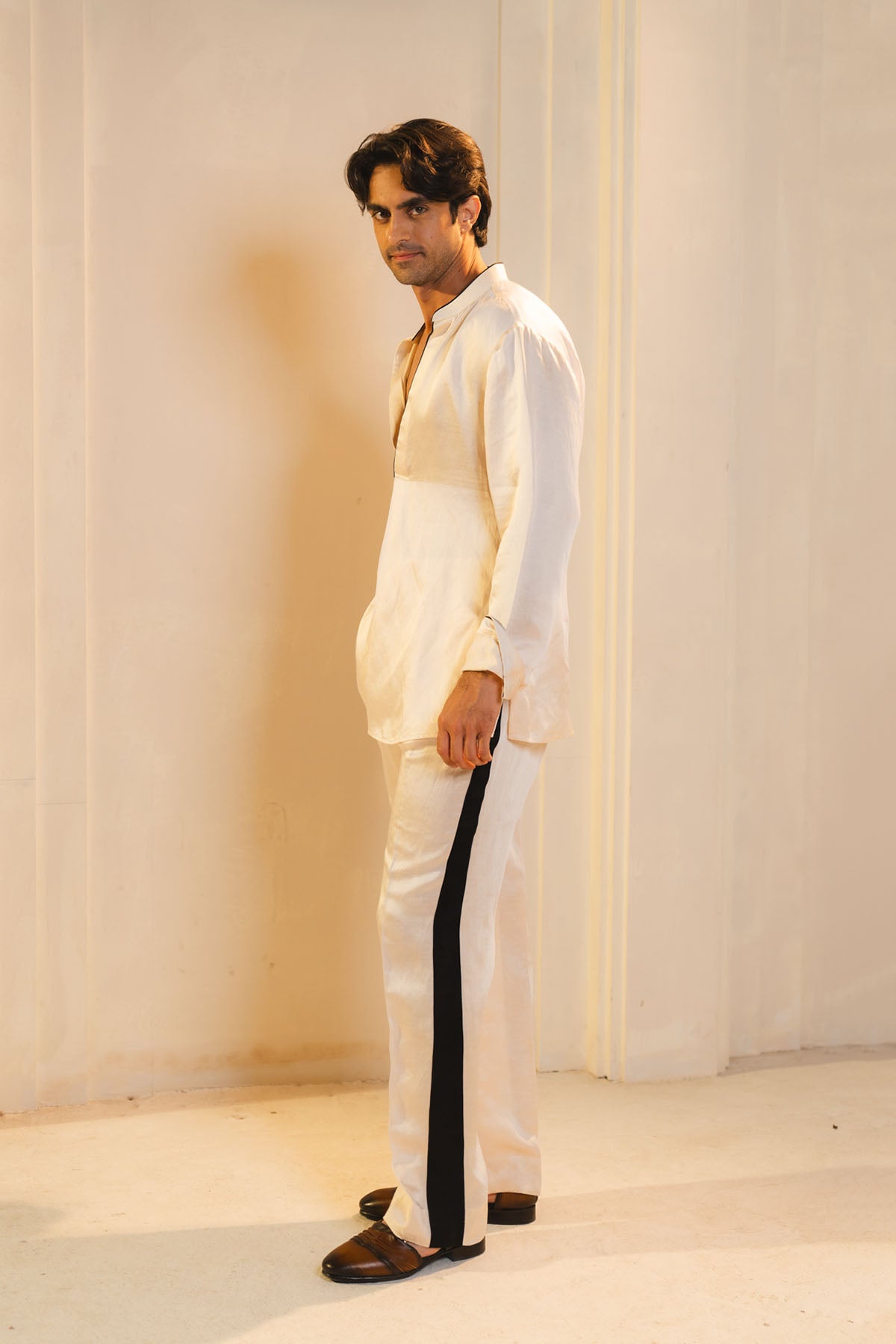 Kurta Set In Pearl Ash With Black Detailing.