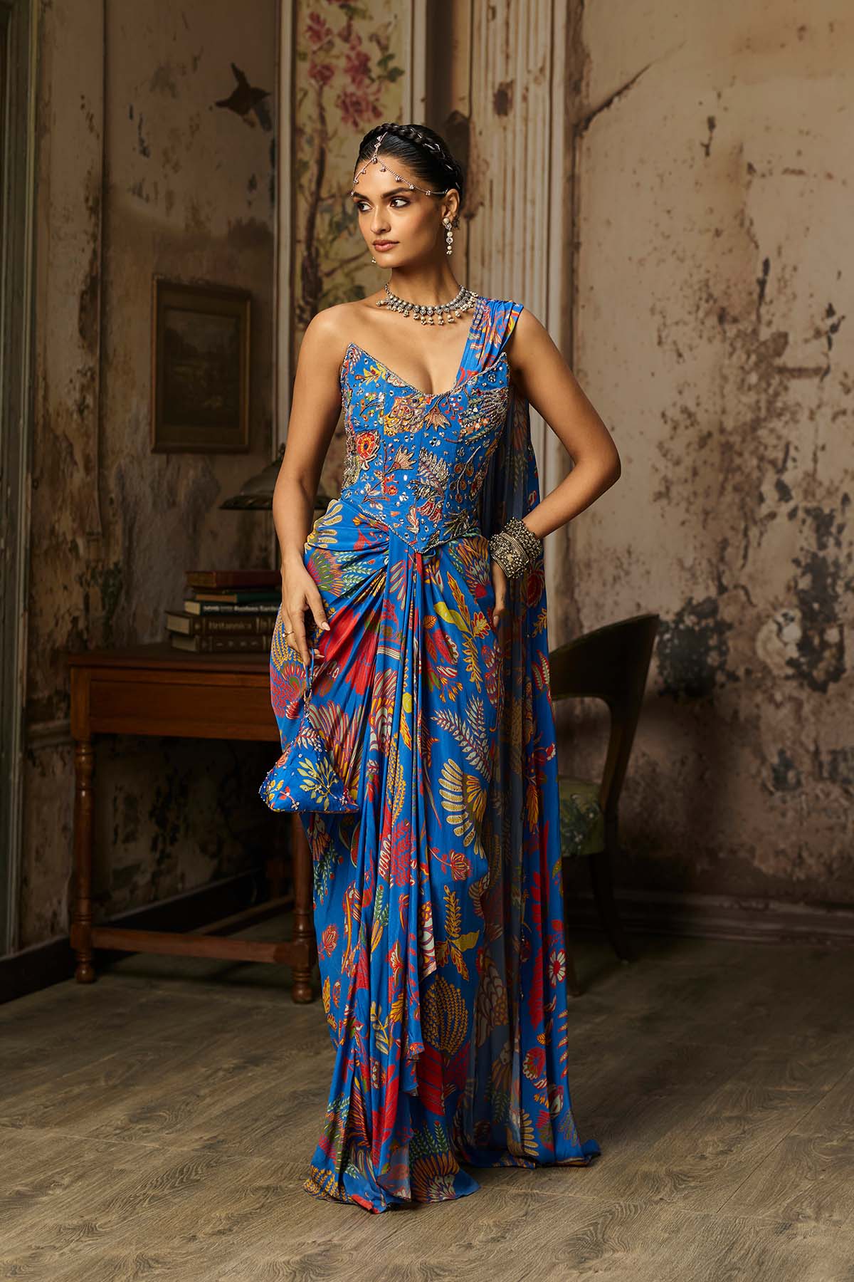 ELECTRIC BLUE PRINTED AND HIGHLIGHTED CORSET DHOTI SKIRT SAREE SET