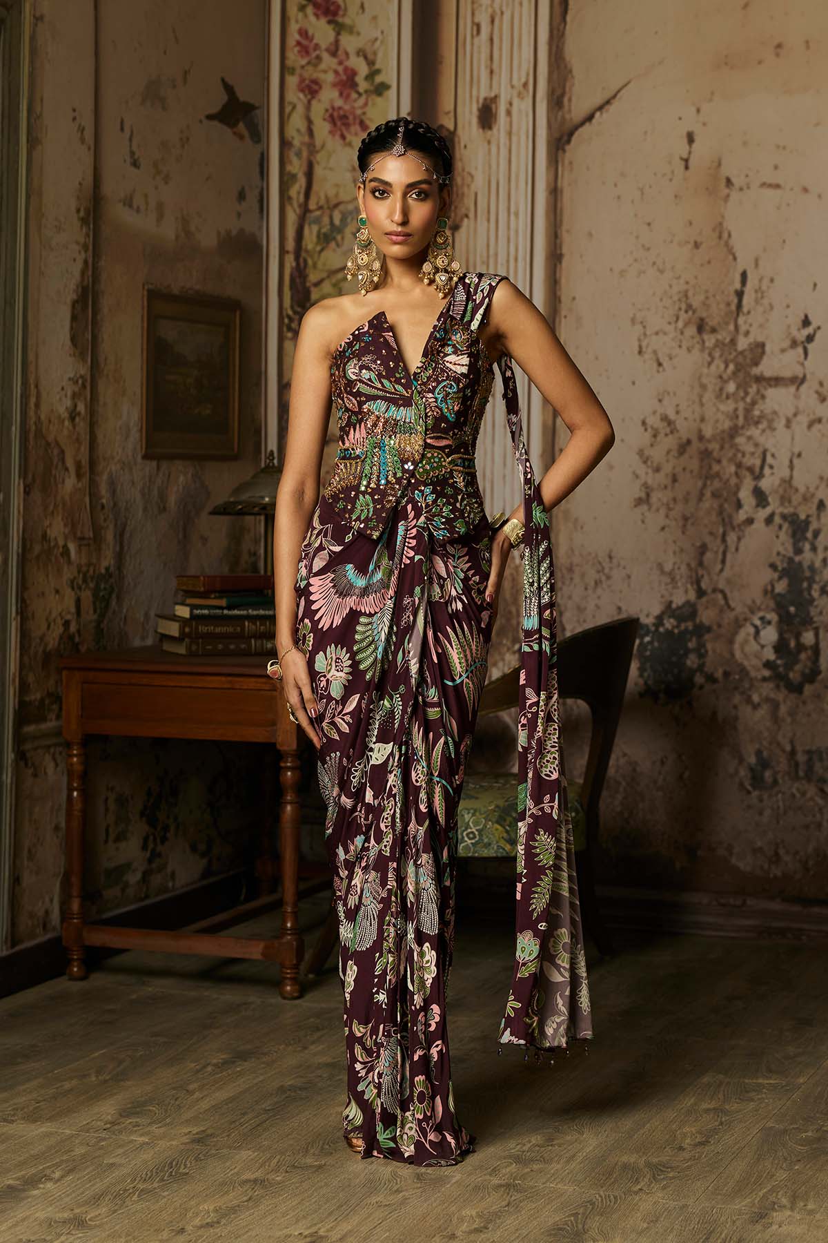 PLUM PRINTED AND HIGHLIGHTED CORSET WITH DHOTI SKIRT SAREE SET