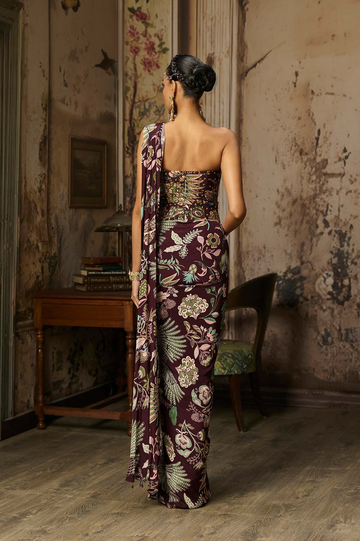 PLUM PRINTED AND HIGHLIGHTED CORSET WITH DHOTI SKIRT SAREE SET