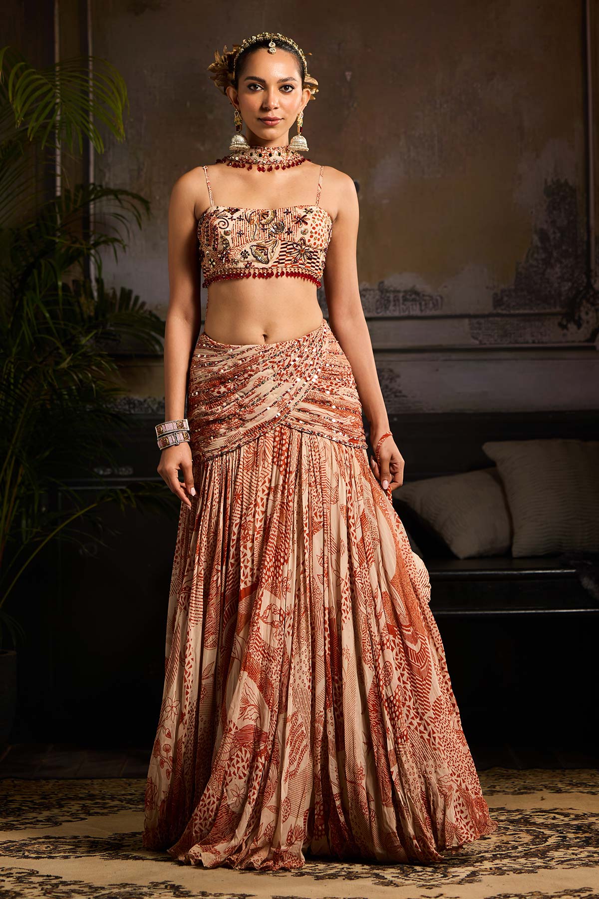 Nora Fatehi in Beige & Rust Print and Highlighted Lehenga Set