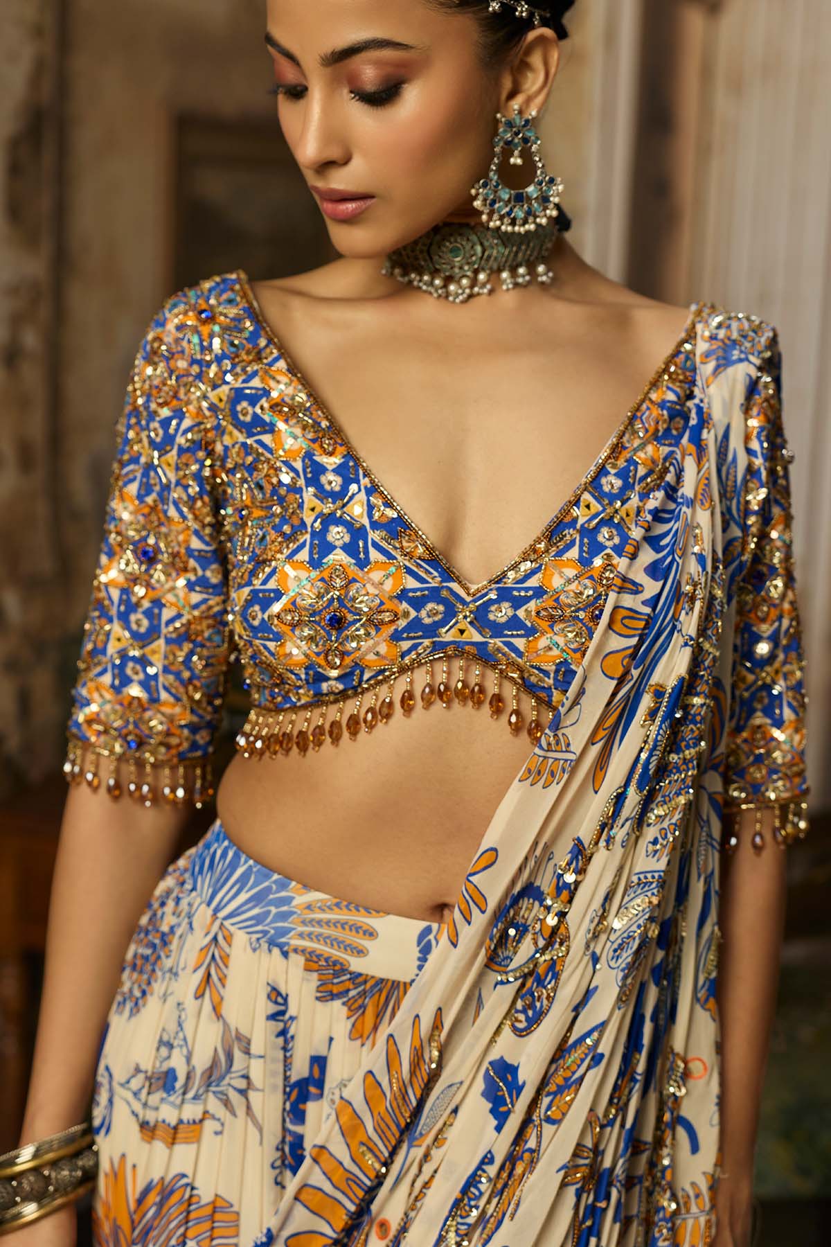 IVORY PRINTED AND HIGHLIGHTED TIERED SKIRT SAREE SET