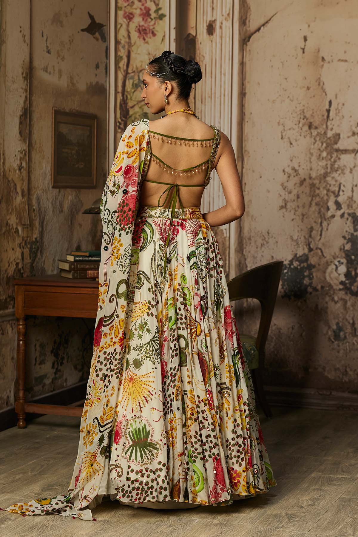 LIGHT GOLD EMBELLISHED BLOUSE AND HIGHLIGHTED LEHENGA SET