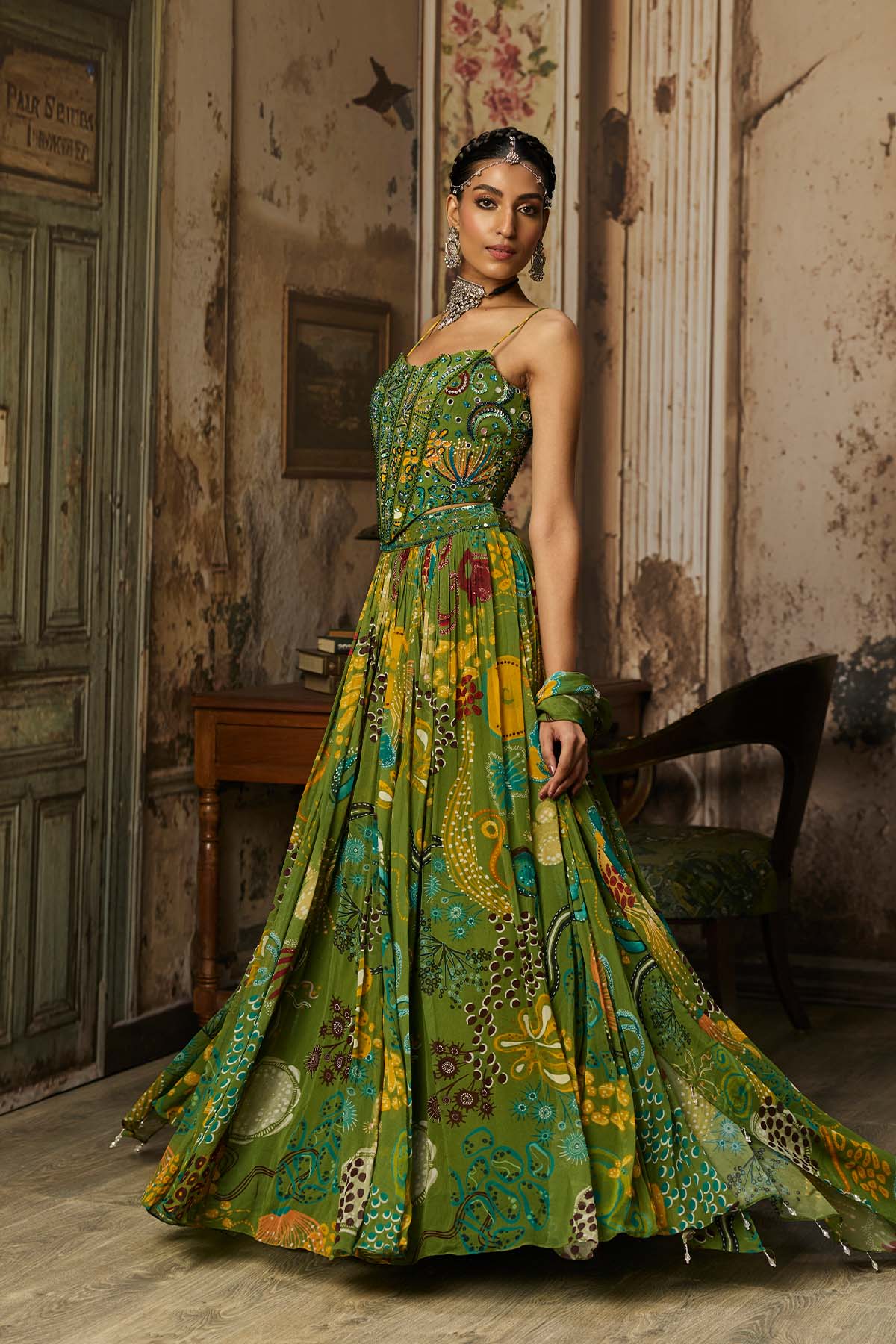 PEAR GREEN PRINTED AND HIGHLIGHTED CORSET LEHENGA SET