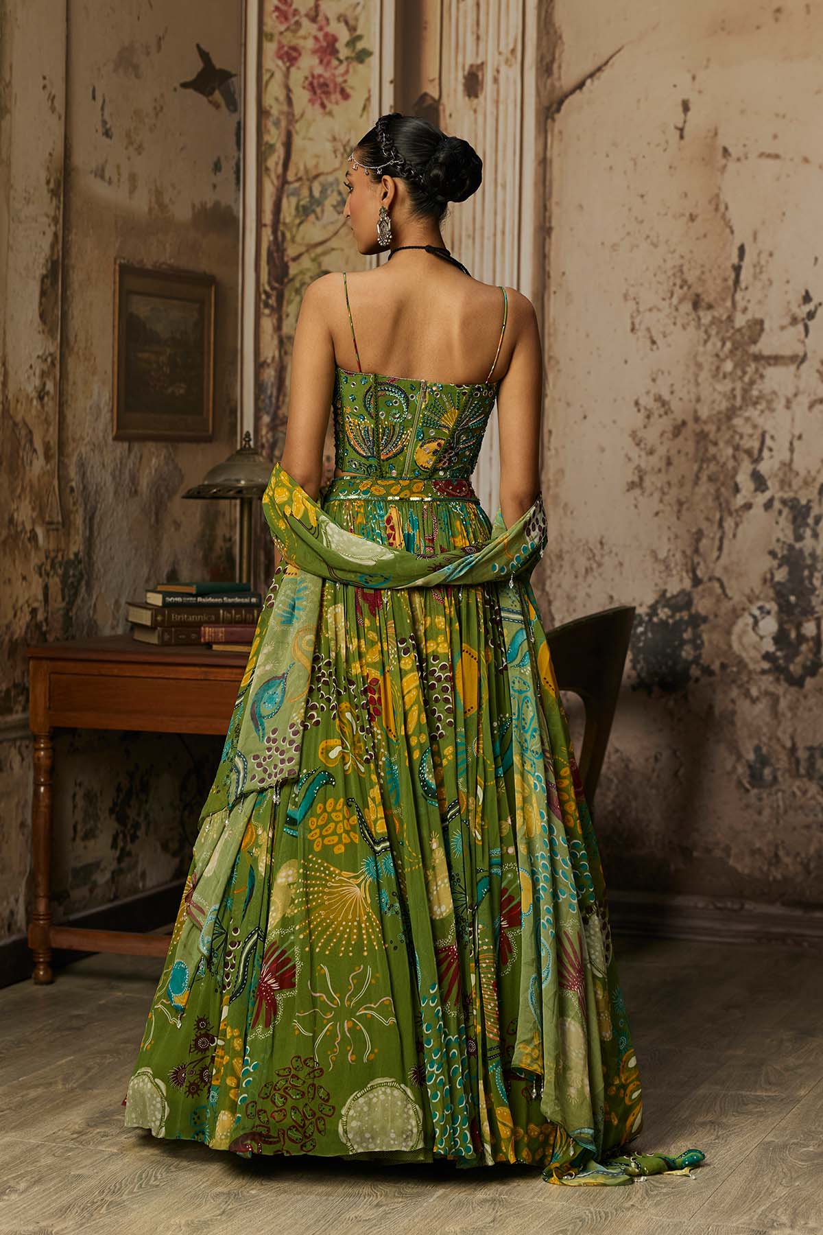 PEAR GREEN PRINTED AND HIGHLIGHTED CORSET LEHENGA SET