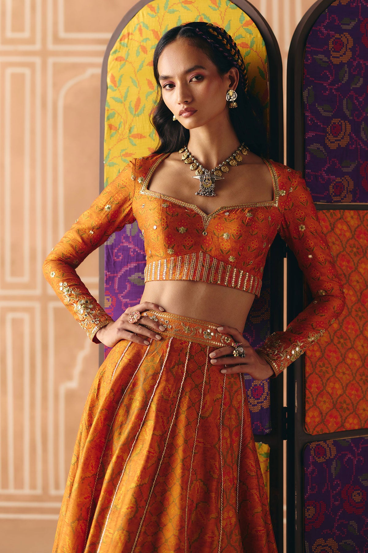 Burnt orange mix print panel lehenga