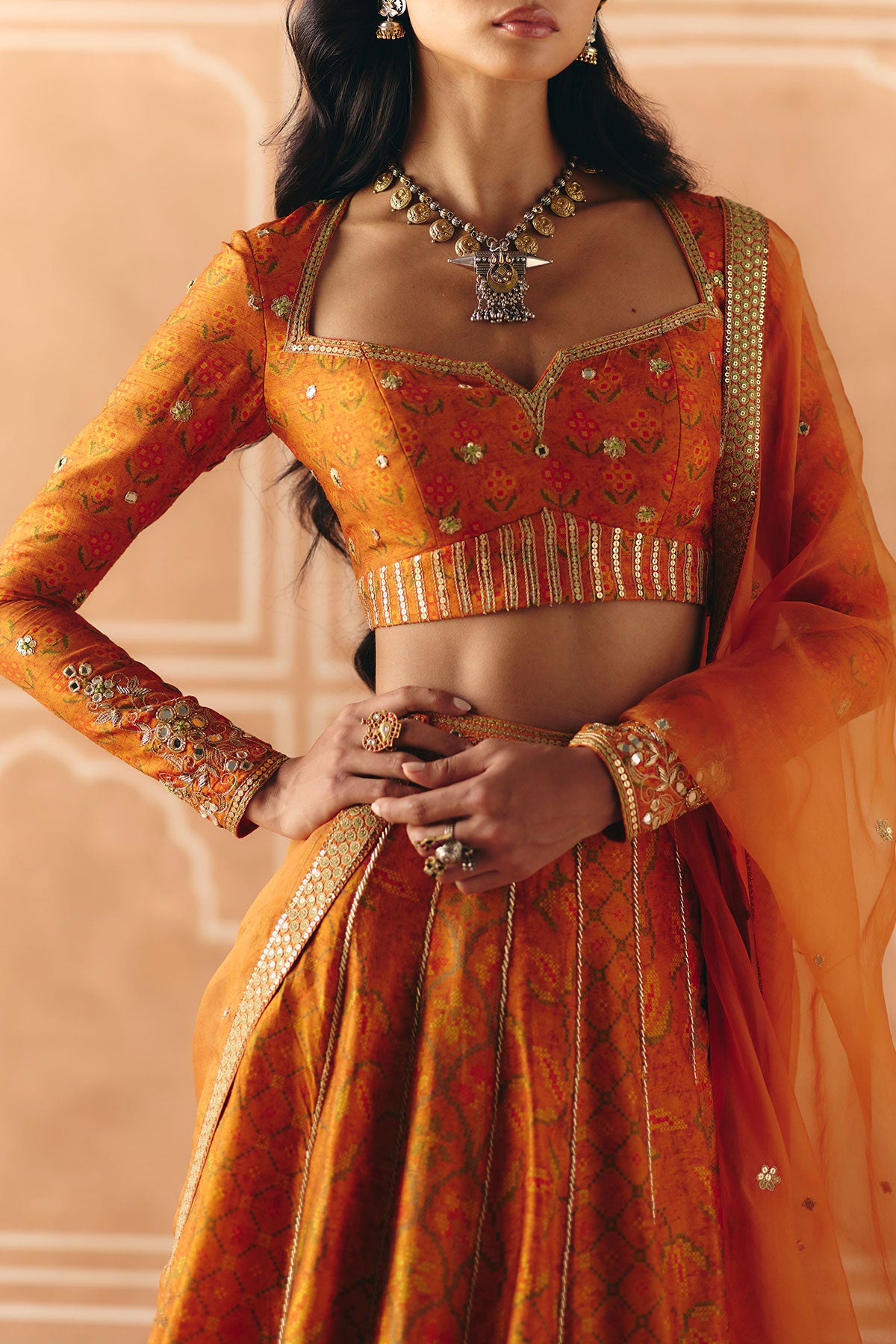Burnt orange mix print panel lehenga