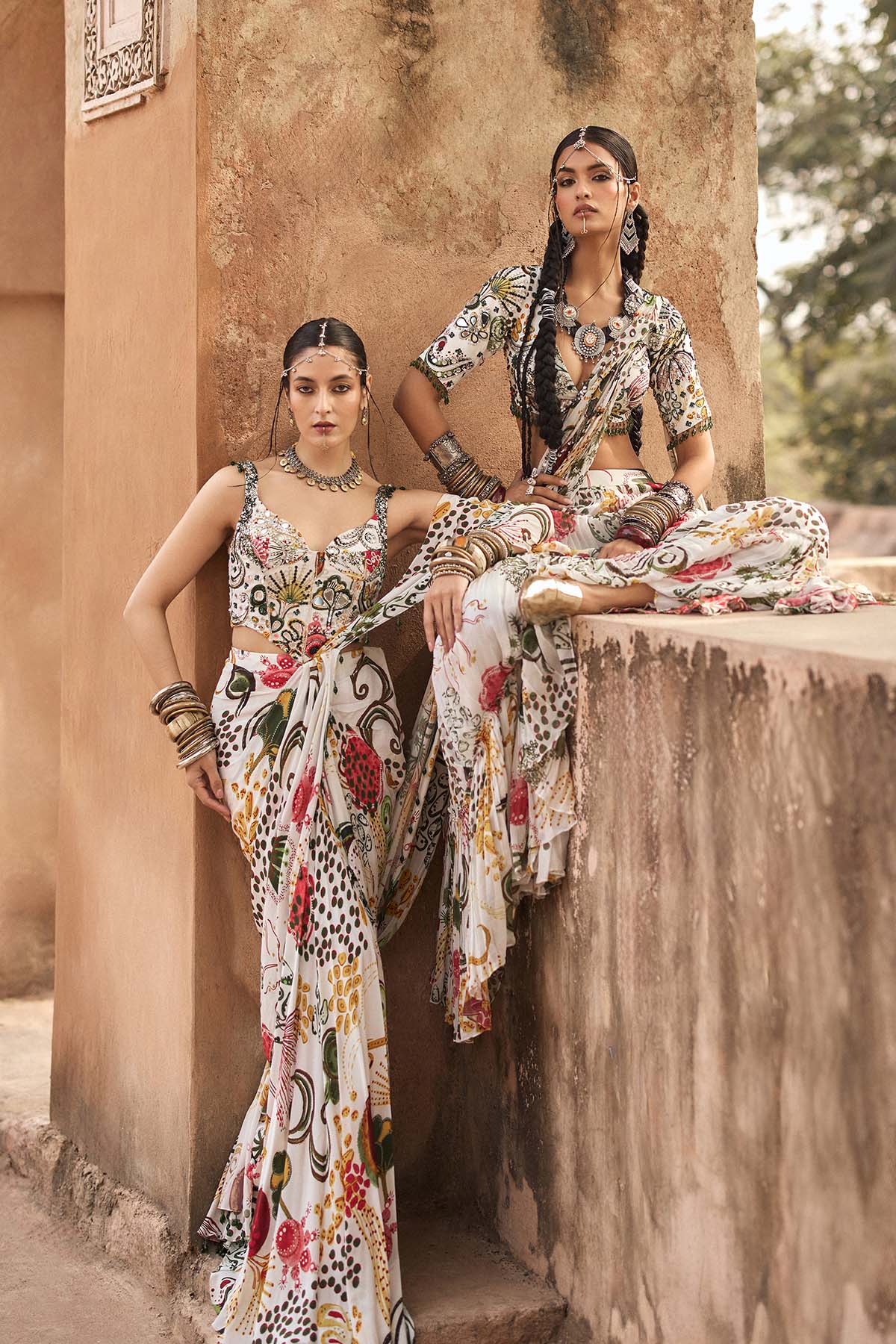 IVORY PRINT AND HIGHLIGHTED CORSET WITH  DHOTI SKIRT SAREE SET