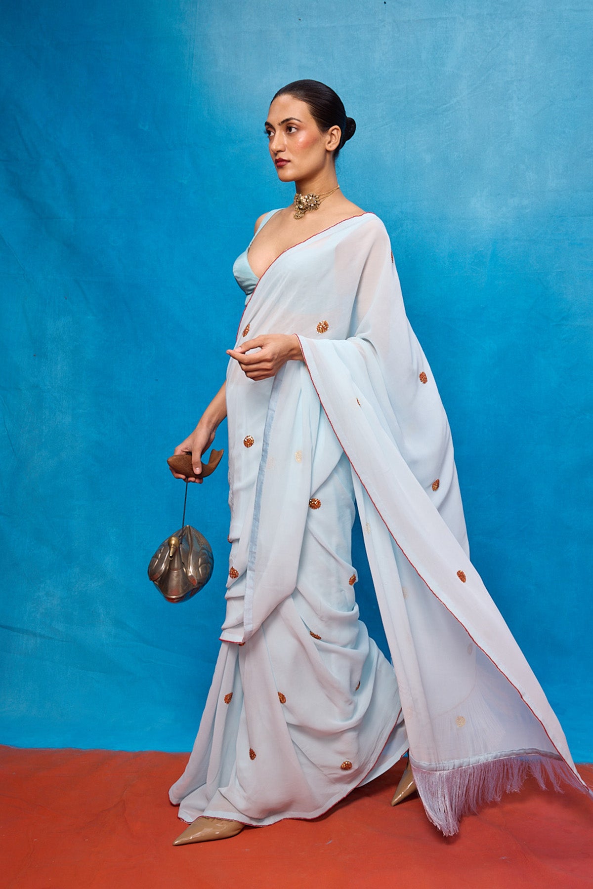 Handwoven Ice Blue Georgette Embroidered Saree