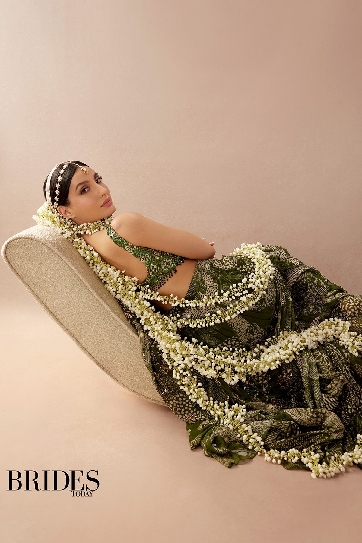 Nora Fatehi in Sage Green Print and Highlighted Skirt Saree Set