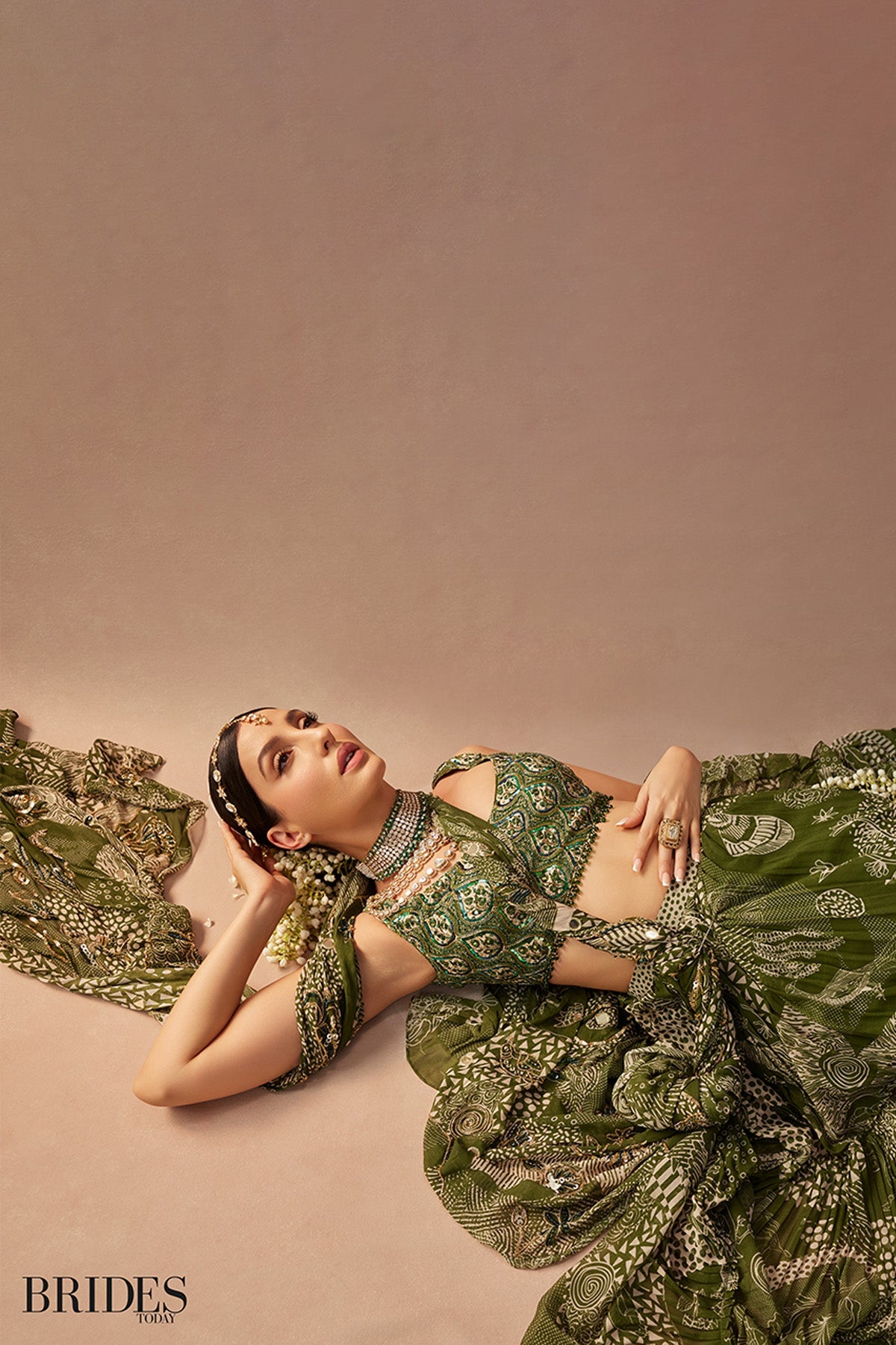 Nora Fatehi in Sage Green Print and Highlighted Skirt Saree Set