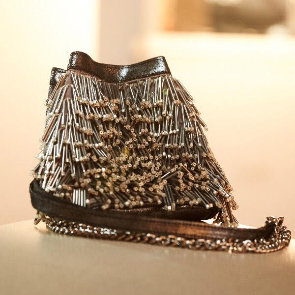 Metallic Leather Backpack With Metallic Tassels