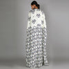 WHITE JAALI PRINT BUSTIER AND DRAPE SKIRT PAIRED WITH WHITE HALF BIRD PRINT AND HALF GEOMETRIC DAMASK PRINT CAPE