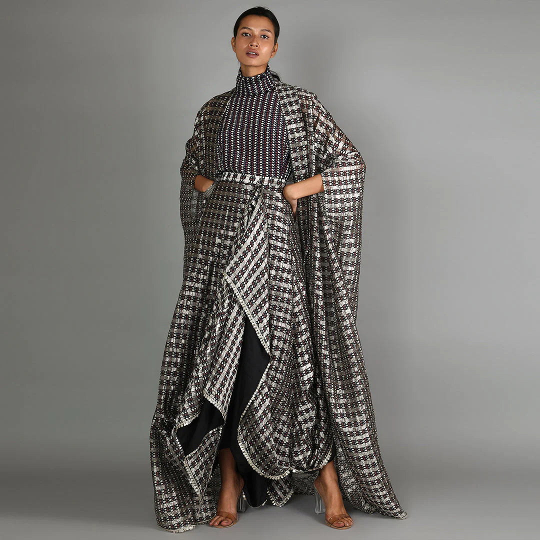 BLACK JAALI PRINT CHANDERI DRAPE SKIRT AND CAPE PAIRED WITH TURTLE NECK PRINTED TOP