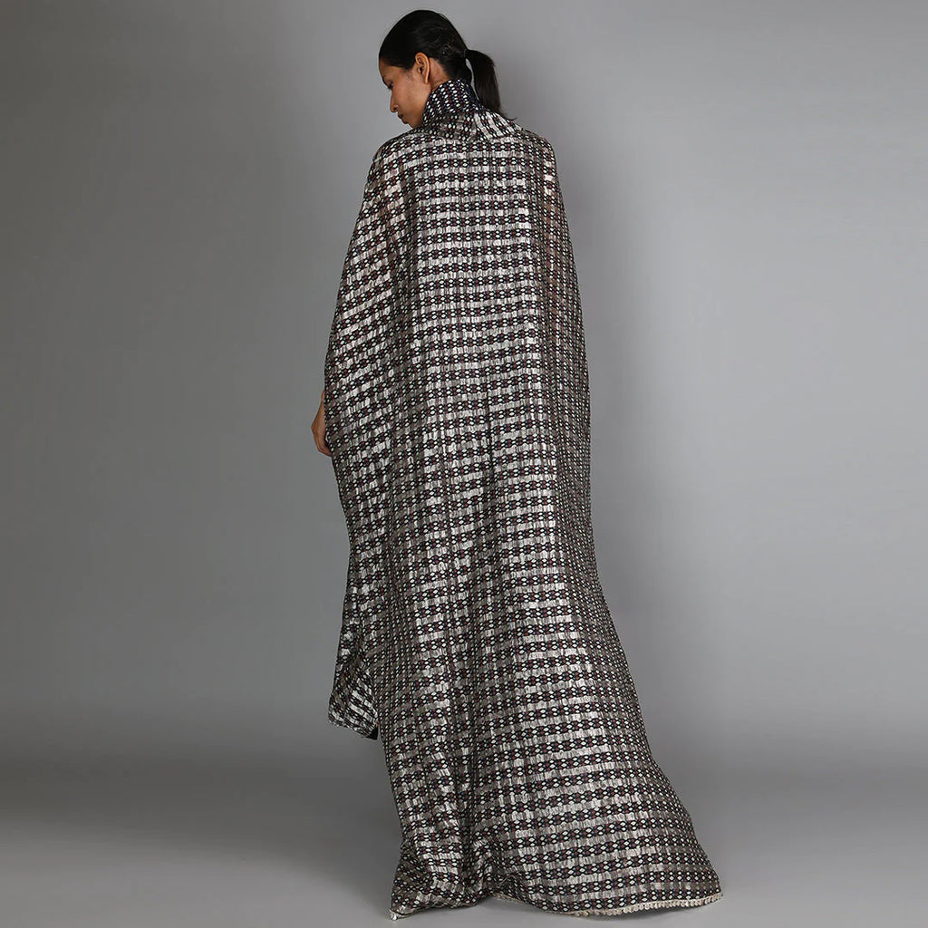 BLACK JAALI PRINT CHANDERI DRAPE SKIRT AND CAPE PAIRED WITH TURTLE NECK PRINTED TOP